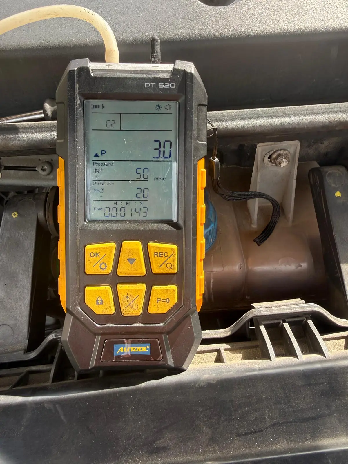 DPF cleaning check being done with a diagnostic machine.