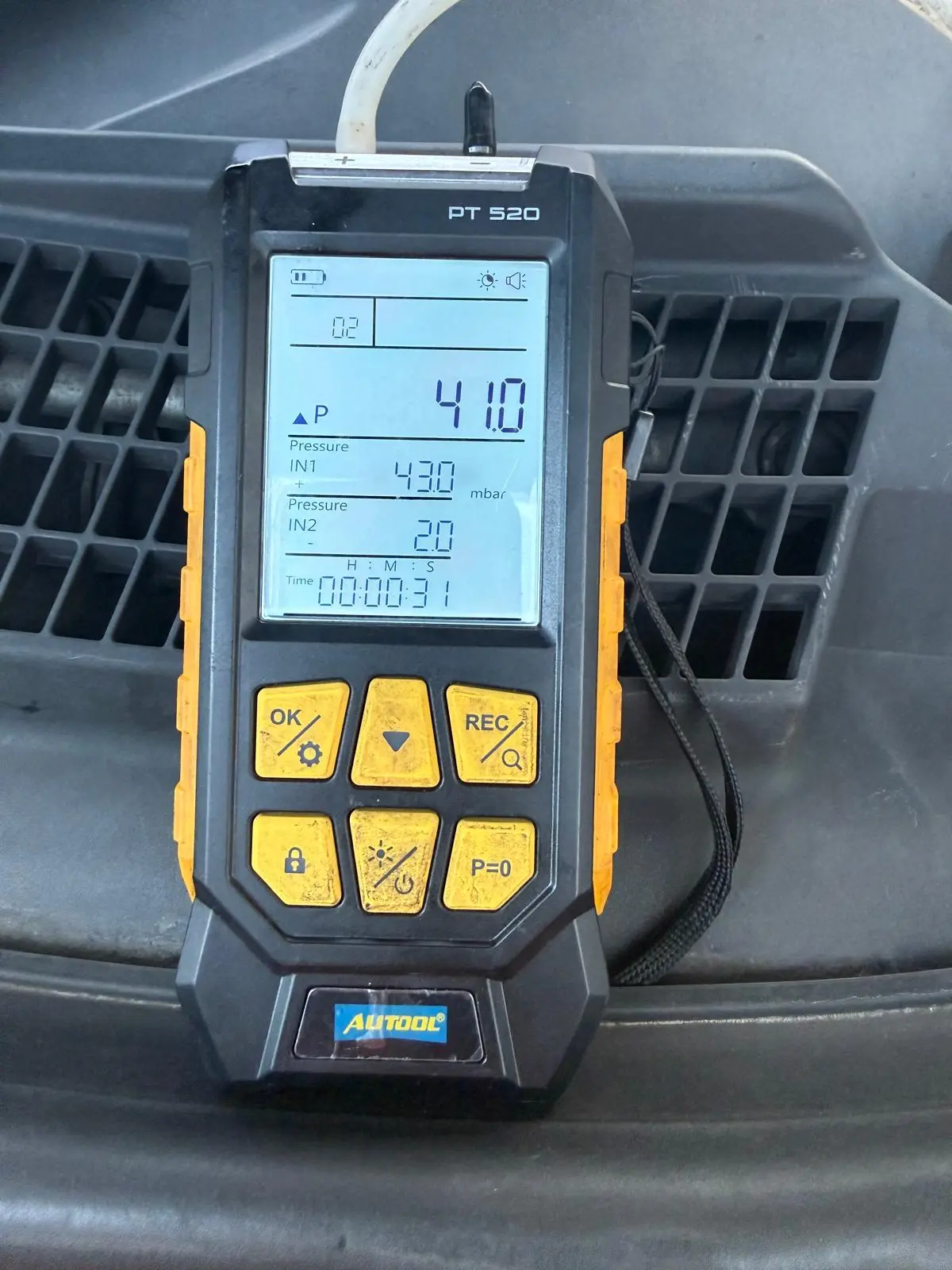 DPF cleaning process diagnostic check showing improved pressure readings after service using specialist testing equipment.