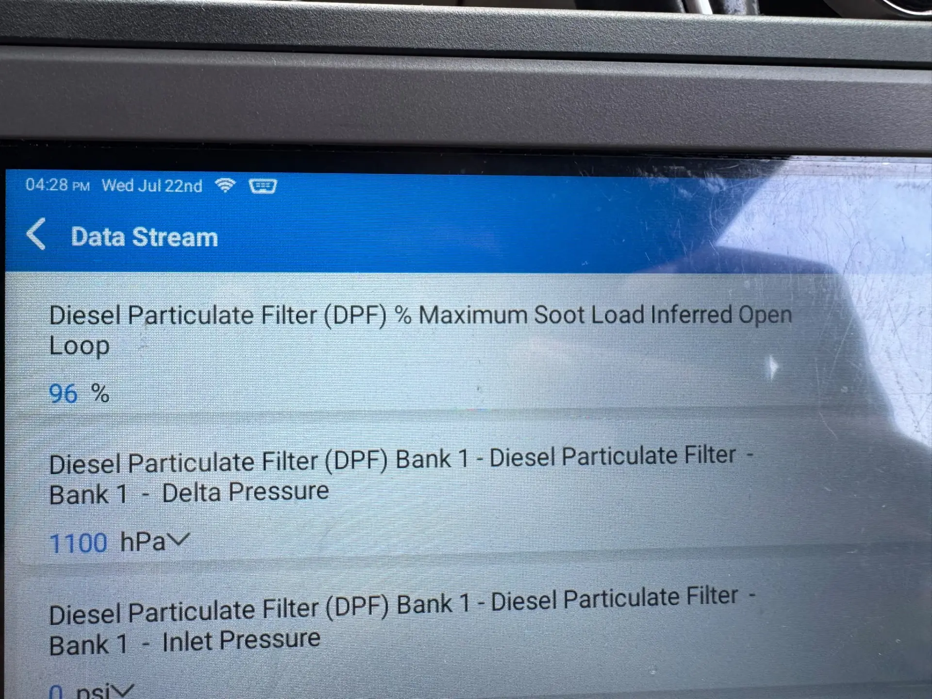 Diagnostic scanner showing a 96% DPF soot load and 1100 hPa differential pressure on a Range Rover Velar.